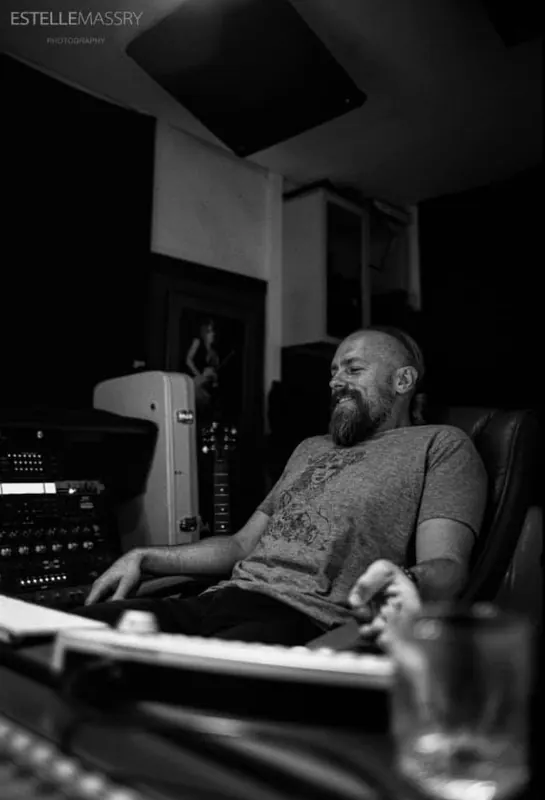Black-and-white portrait of Tommy Kessler in his studio